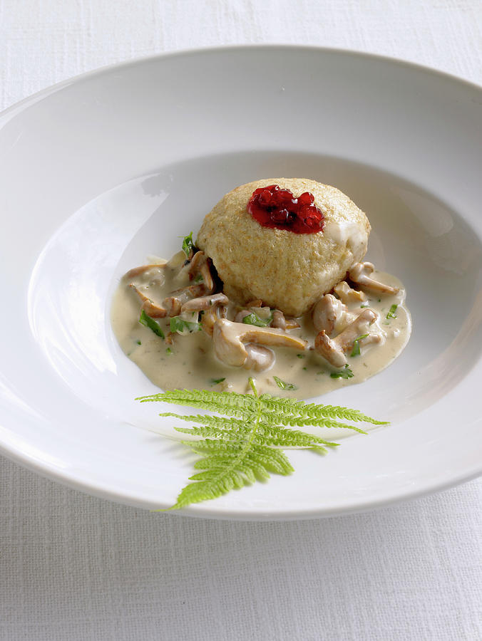 A Steamed Spelt Dumpling With Mushroom Sauce And Cranberry Jam Photograph by Barbara Lutterbeck