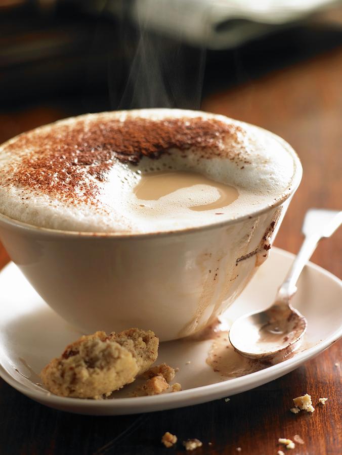 A Steaming Cappuccino With Milk Foam Photograph by Atkinson / Sue Dr.