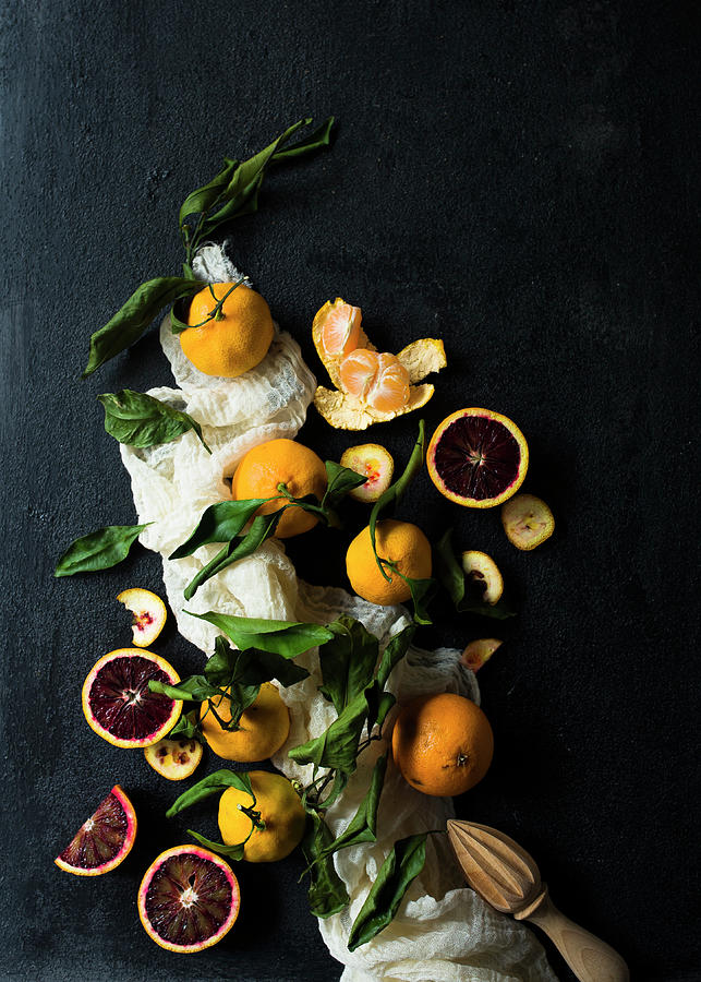 A Still Life With Different Oranges Varieties On A Black Background Photograph by Lisa Rees