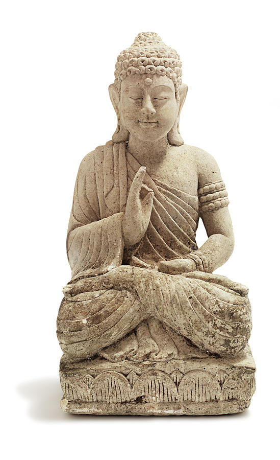 A Stone Buddha Ornament On A White Photograph by Mentalart