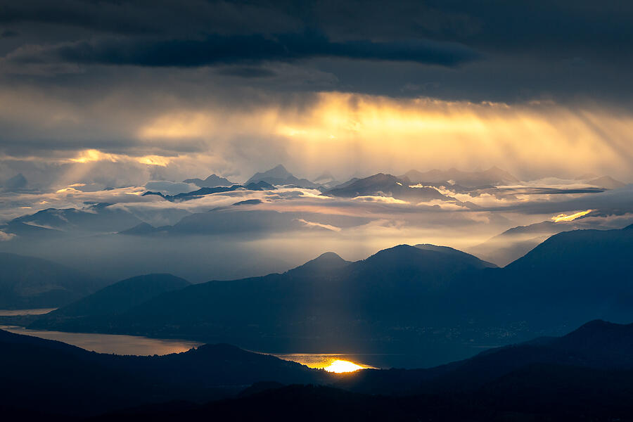 A Storm Above The Alps Photograph by Maciej Karpinski