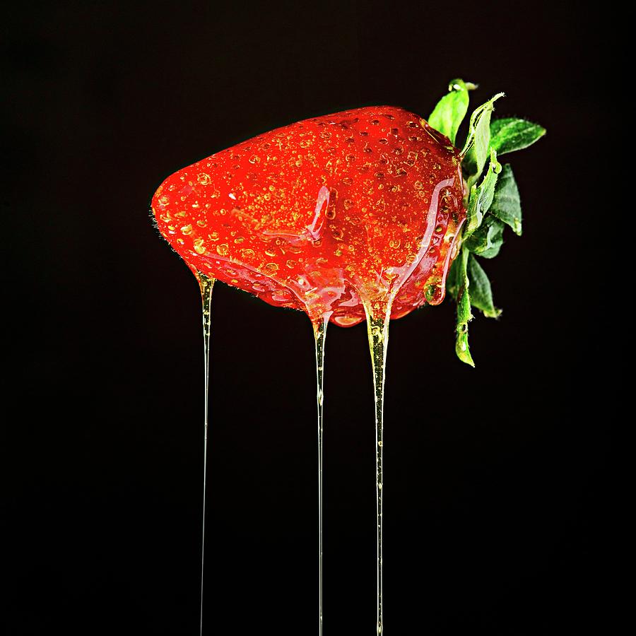 A Strawberry Dripping With Honey close-up Photograph by Manuel Krug