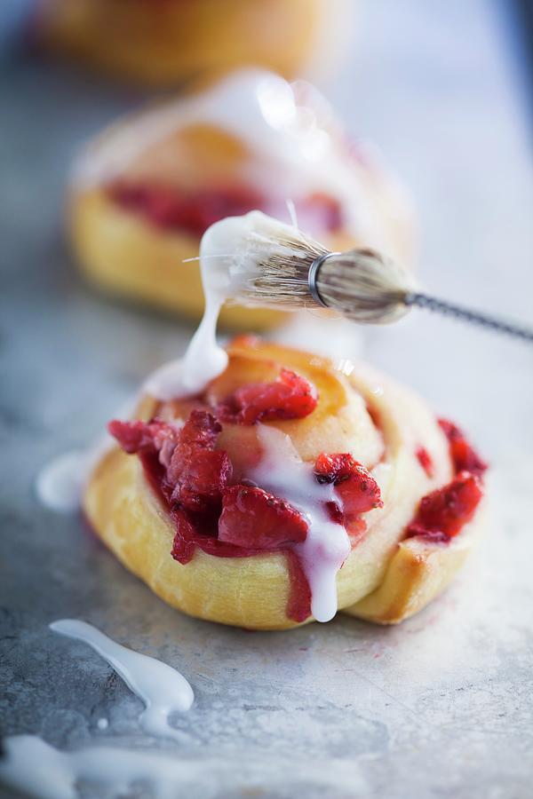 A Strawberry Pastry Drizzled With Icing Photograph by Eising Studio