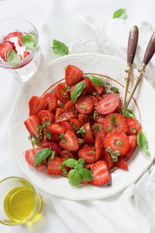 A Strawberry Salad With Olive Oil, Balsamic And Basil Photograph by Adel Bekefi