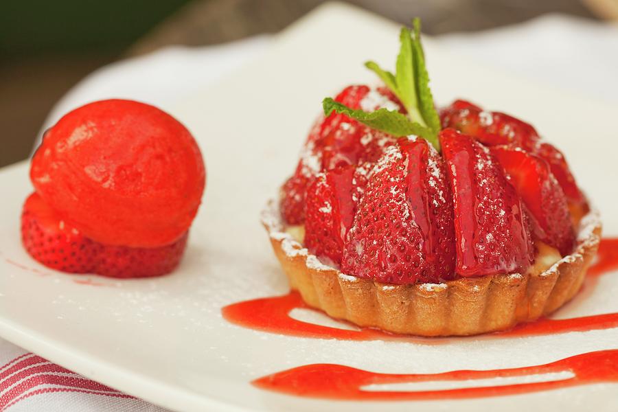 A Strawberry Tartlet And Strawberry Sorbet Photograph by Creative Photo Services