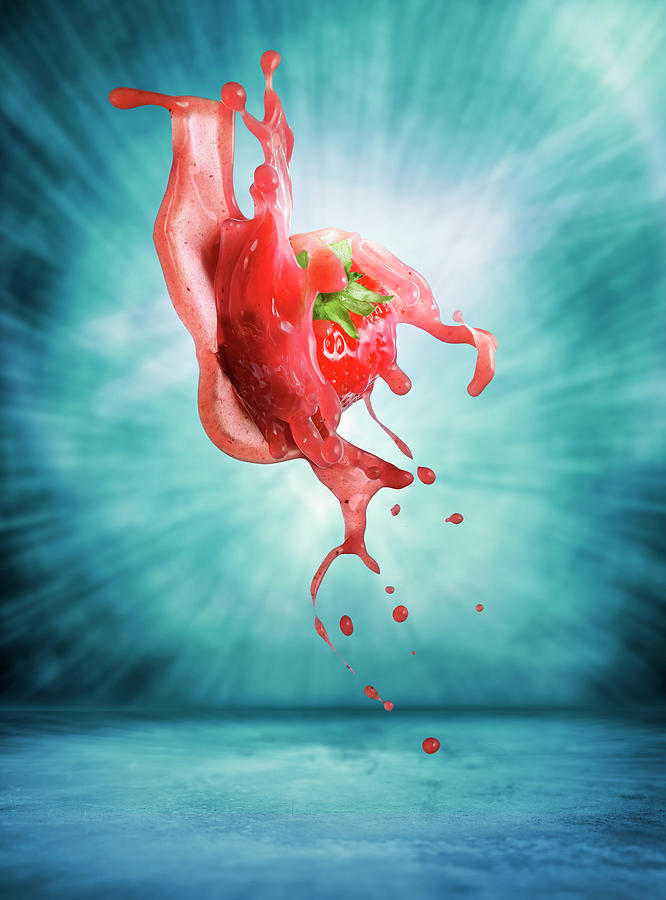 A Strawberry With A Splash Of Juice Photograph by Petr Gross