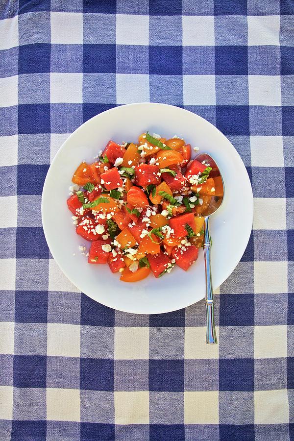 A Summer Salad With Tomato, Watermelon, Coriander And Feta Cheese On A Blue Checked Tablecloth Photograph by Andre Baranowski