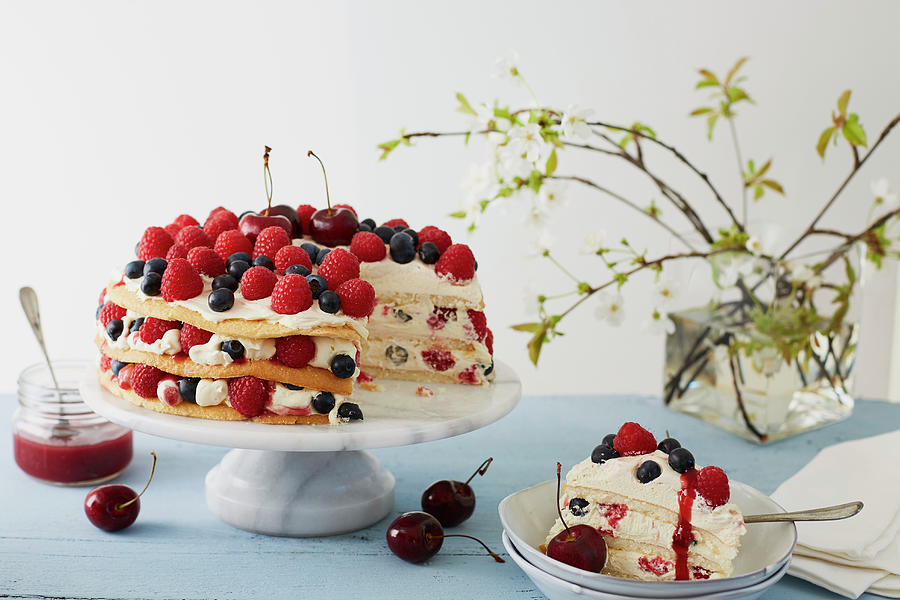 A Summery Layer Cake With Berries And Cherries, Sliced Photograph by Kathrin Mccrea
