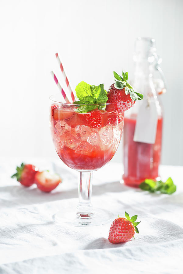 A Summery Strawberry Spritzini Made With Strawberry Pure, Vodka And Mint Photograph by Fotografie-lucie-eisenmann