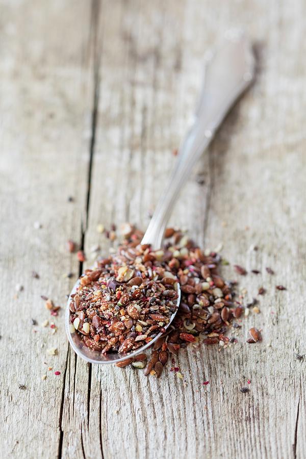 A Super Fruit Topping Made From Flaxseed, Chia Seats, Lucmo, Goji Berries, Dates, Hemp Seeds And Psyllium Photograph by Jan Wischnewski