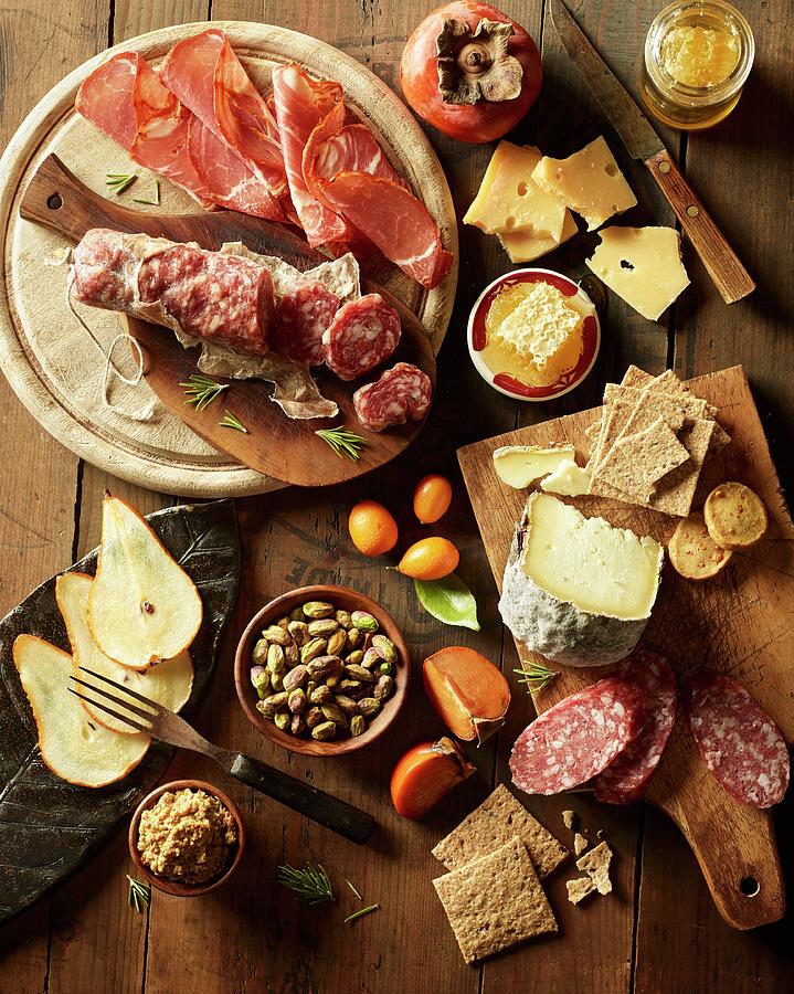 A Supper Of Cold Cuts, Cheese, Nuts And Fruit Photograph by Michael S. Harrison