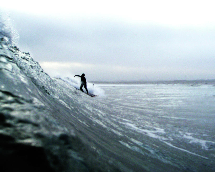 A Surfer Rides On Cold Long Wall Photograph by Tsuyoshi Uda