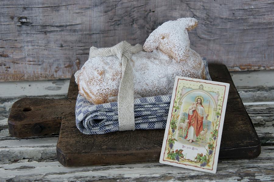 A Sweet Easter Lamb With A Picture Of A Saint Photograph by Martina Schindler