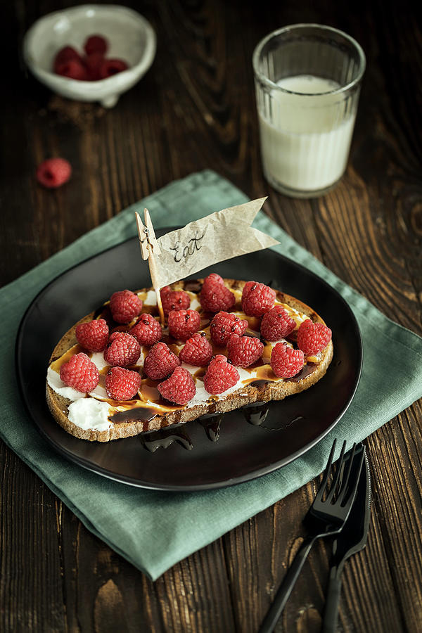 A Sweet Open Sandwich With Cream Cheese, Raspberries And Maple Syrup Photograph by Valeria Aksakova