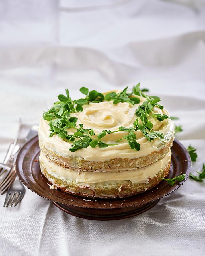 A Sweet Pea Cake With Lemon Cream Cheese Cream And Pea Shoots Photograph by Great Stock!