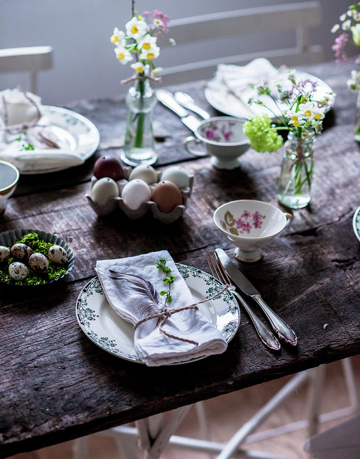 A Table Laid For Easter With Spring Flowers And Eggs Photograph by Carolin Strothe