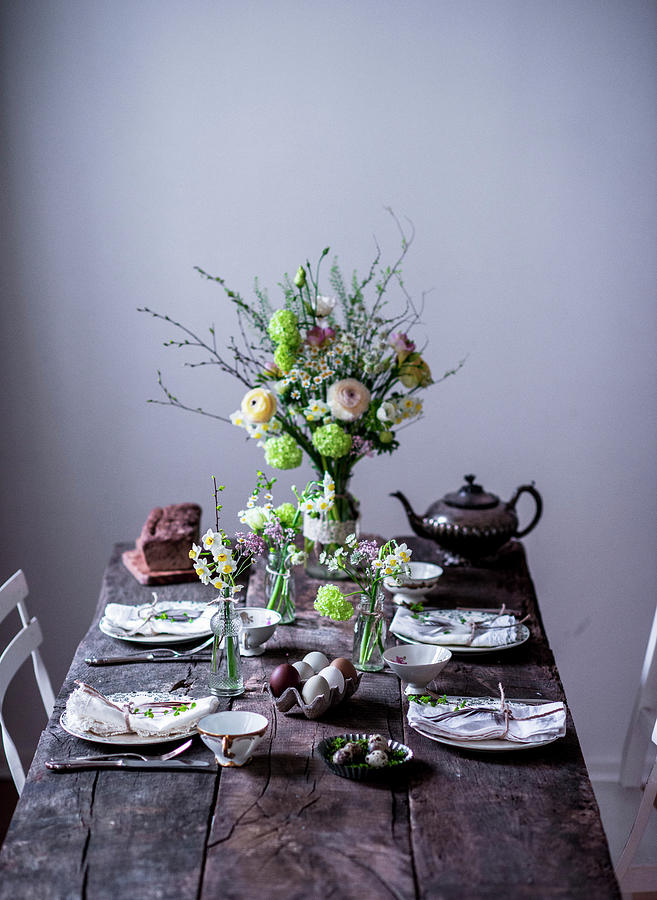 A Table Laid For Easter With Spring Flowers Photograph by Carolin Strothe