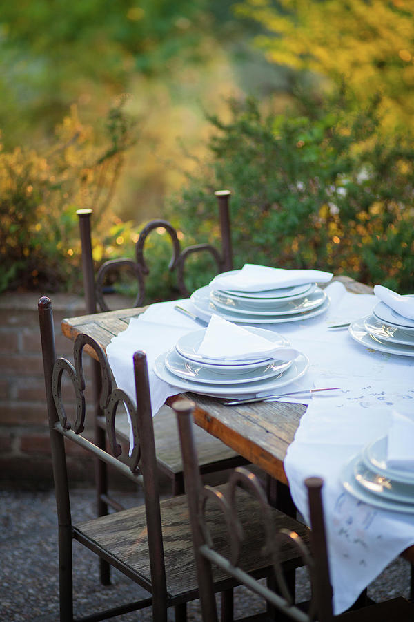 A Table Laid On A Restaurant Terrace italy Photograph by Eising Studio