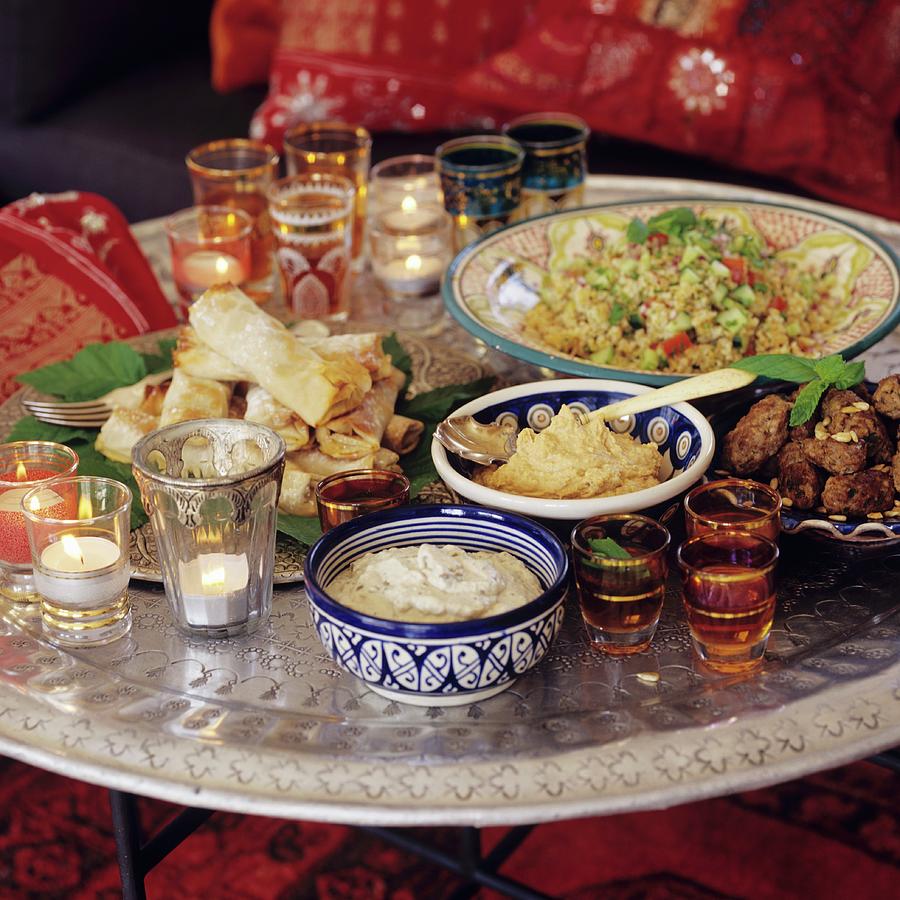 A Table Laid With Assorted Dishes From North Africa Photograph by Tine Guth Linse