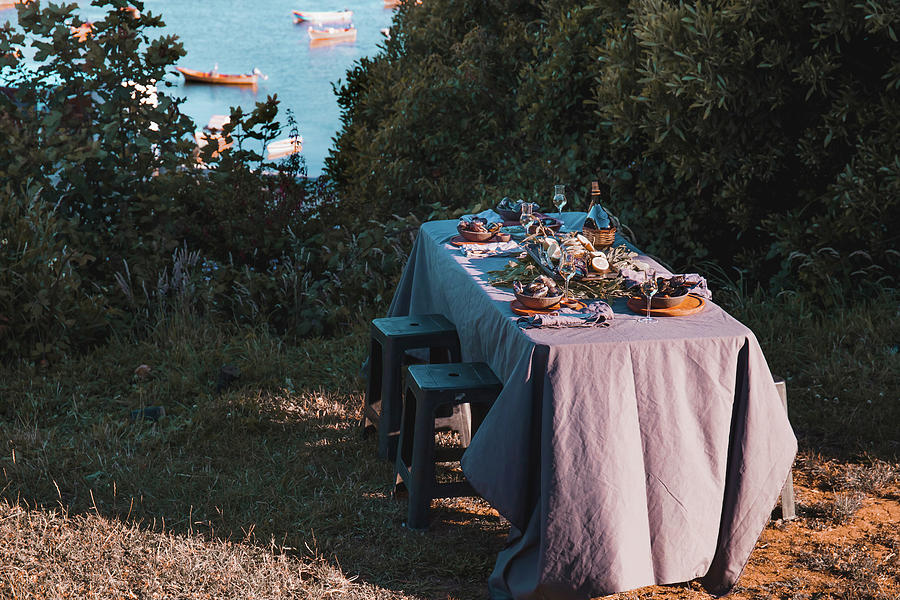A Table Laid With Seafood And Wine By The Sea Photograph by Larisa Blinova