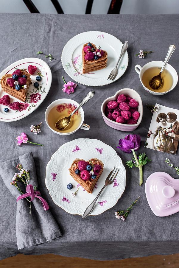 A Table Set For Valentines Day With Waffles, Berries And Tea Photograph by Carolin Strothe
