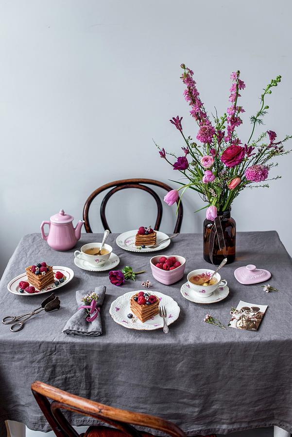 A Table Set For Valentines Day With Waffles, Berries, Tea And A Flower Bouquet Photograph by Carolin Strothe
