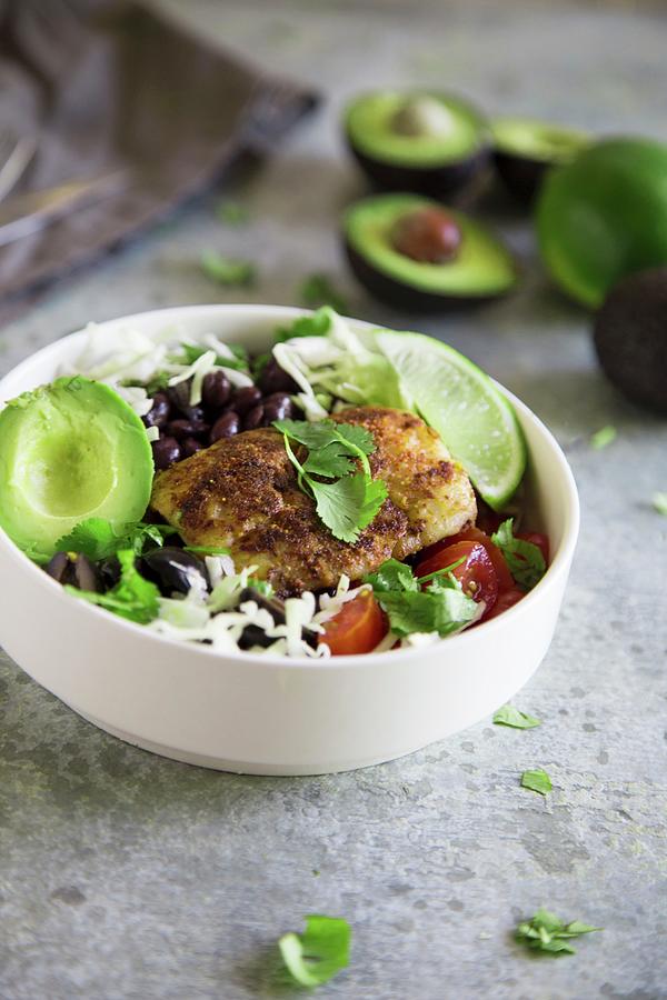 A Taco Bowl With Fish, Avocado, Black Beans, And White Cabbage Photograph by Lori Rice