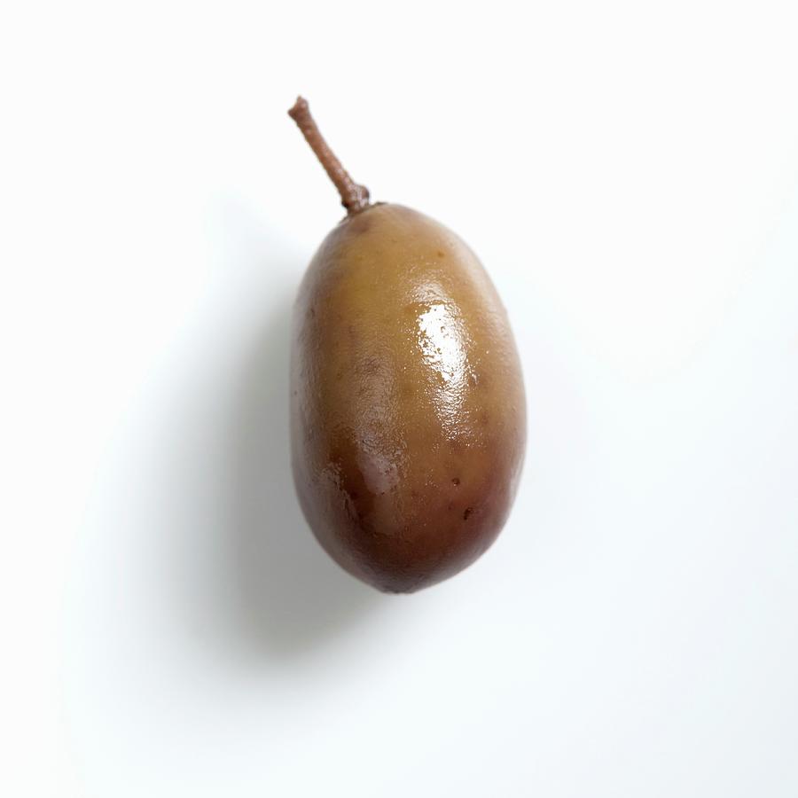 A Taggiasca Olive Photograph by Franco Pizzochero