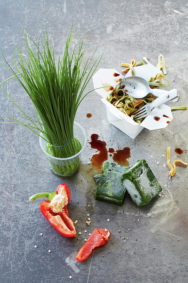 A Take Away Pasta Dish With Chives, Frozen Spinach And Peppers Photograph by Rafael Pranschke