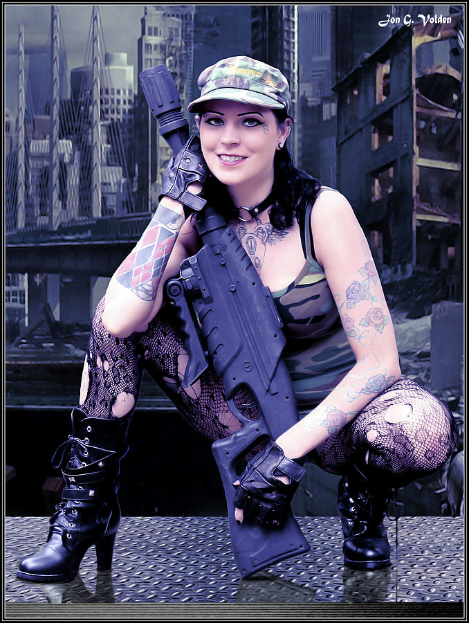 A Tanker Girl With A Gun Photograph by Jon Volden