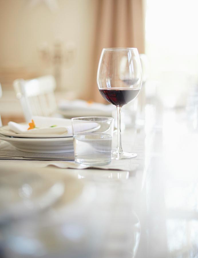 A Thanksgiving Place Setting With A Glass Of Water And A Glass Of Red Wine Photograph By Hannah