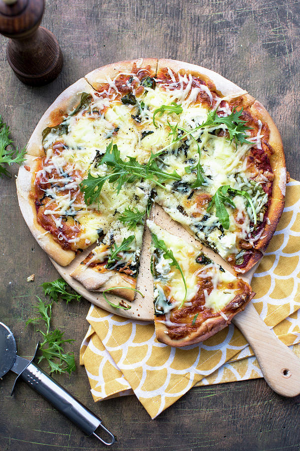 A Three Cheese Pizza With Rocket Photograph by Lara Jane Thorpe