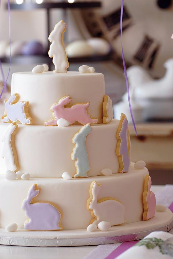 A Three-tier Easter Cake Decorated With Pastel-coloured Rabbits Photograph by Jalag / Gardyo Frhauf-gollnek