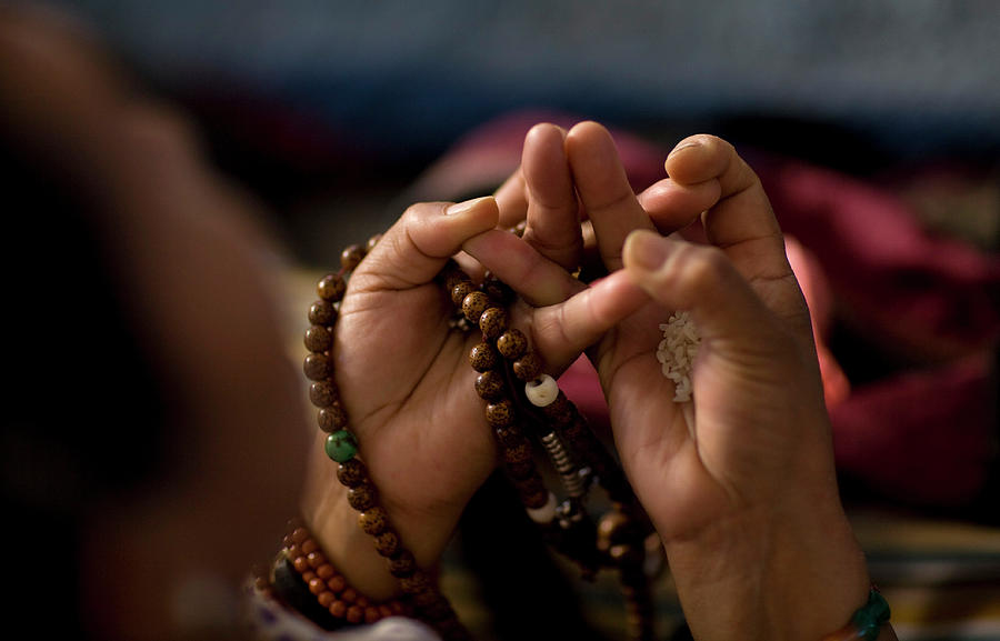 A Tibetan Refugee Holds Prayer Beads Photograph By Adrees Latif - Fine 