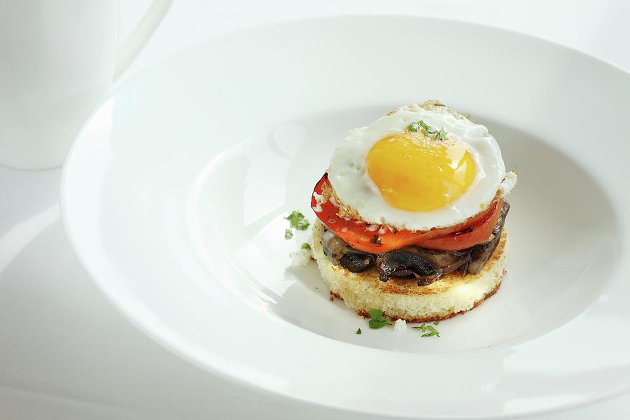 A Toast Canap With Mushrooms, Tomato And Fried Egg Photograph by Perry Jackson
