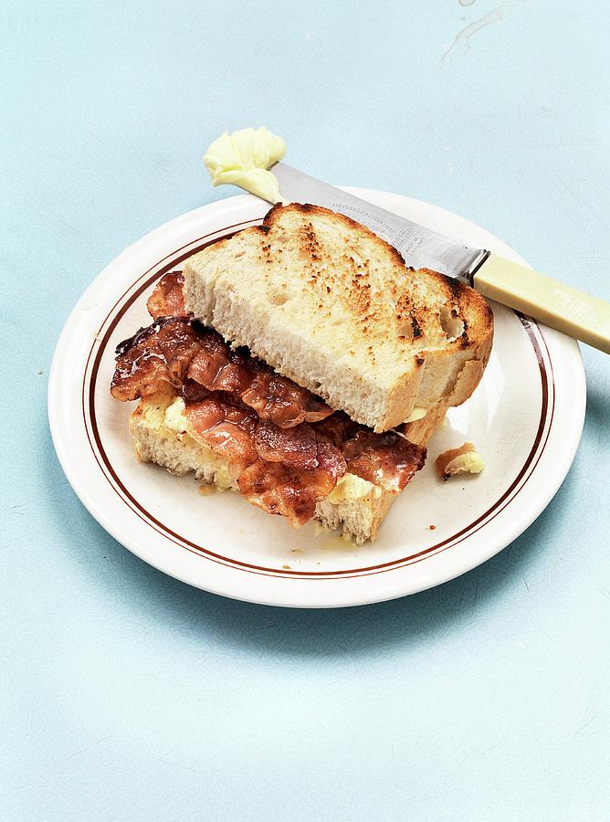 A Toasted Sandwich With Bacon And Butter Photograph by Hugh Johnson