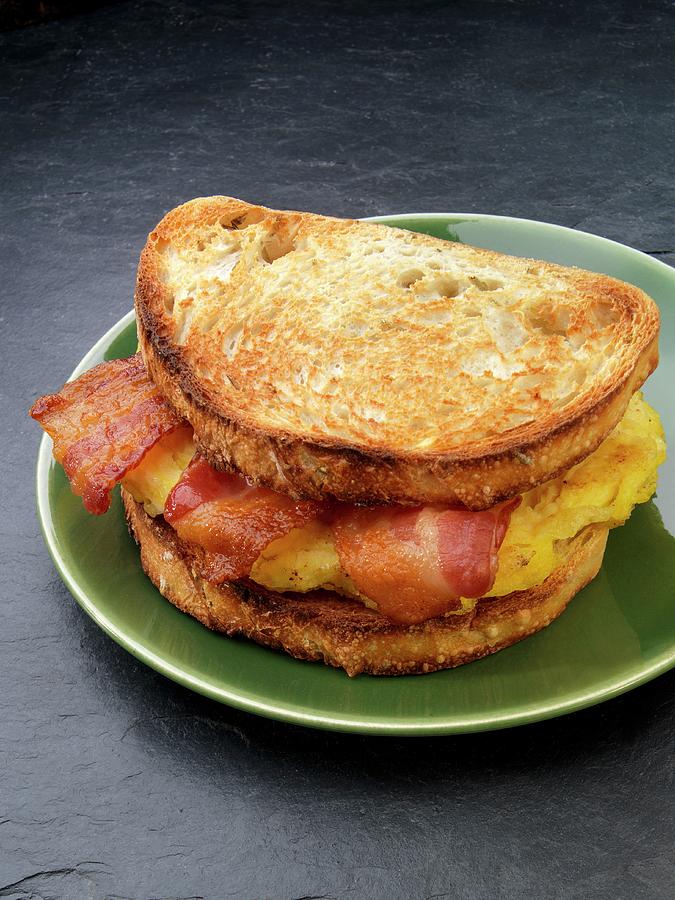 A Toasted Sandwich With Bacon And Egg For Breakfast usa Photograph by Paul Poplis