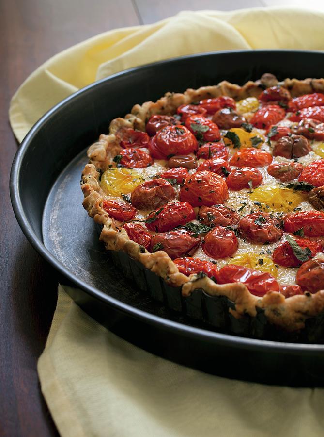 A Tomato Tart With Red And Yellow Tomatoes Photograph by Katharine Pollak