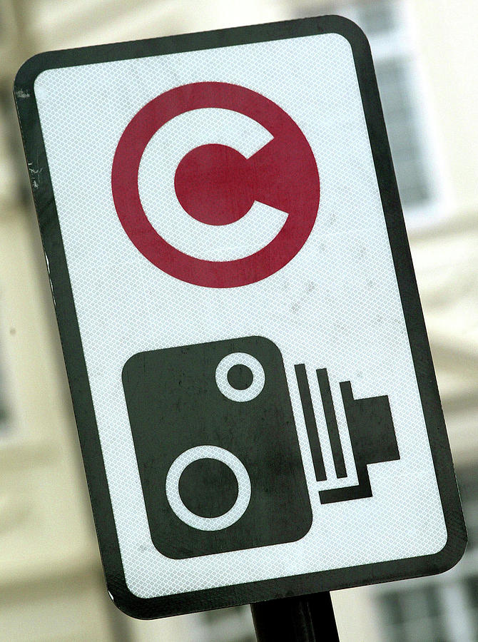 A Traffic Sign With A C Symbol Photograph by Stephen Hird - Fine Art ...