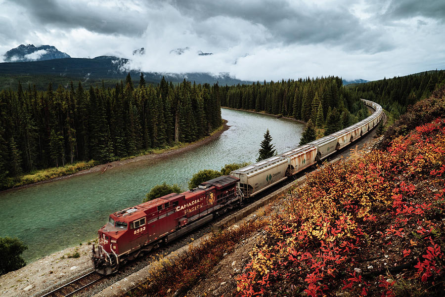 A train in the Banff National Park in Canada Photograph by Kamran Ali