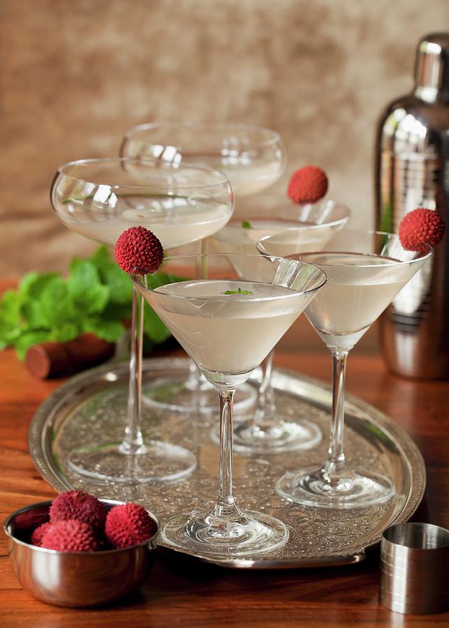 A Tray Of Lychee And Mint Martinis Garnished With Fresh Lychees ...