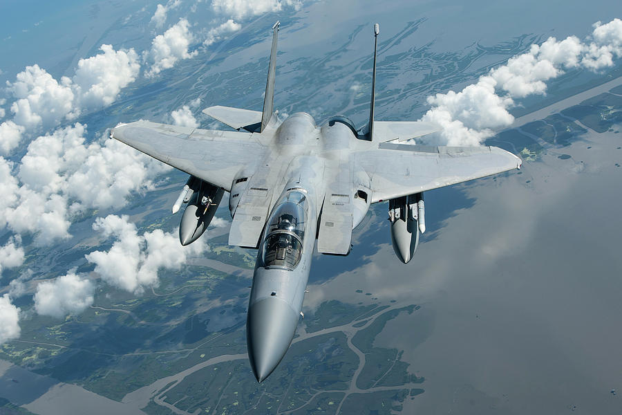 Transportation Photograph - A U.s. Air Force F-15c Over The Gulf by Erik Roelofs