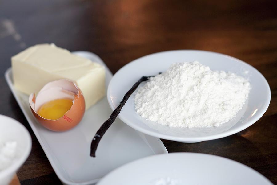 A Vanilla Pod, Flour, An Egg Yolk And Butter Photograph by Timmann, Claudia