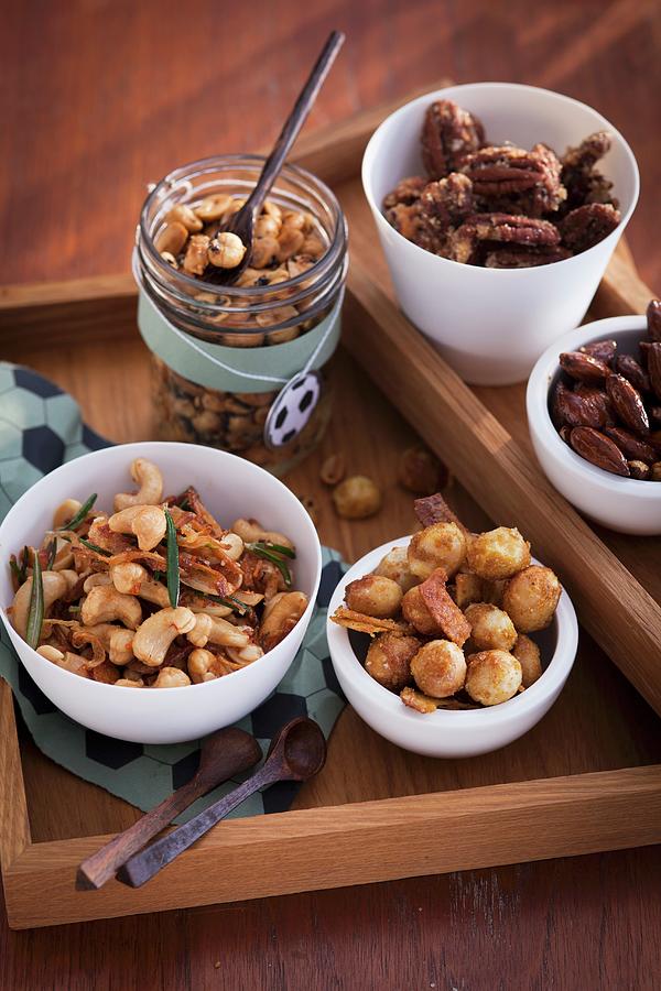 A Variety Of Seasoned Nuts Photograph by Eising Studio