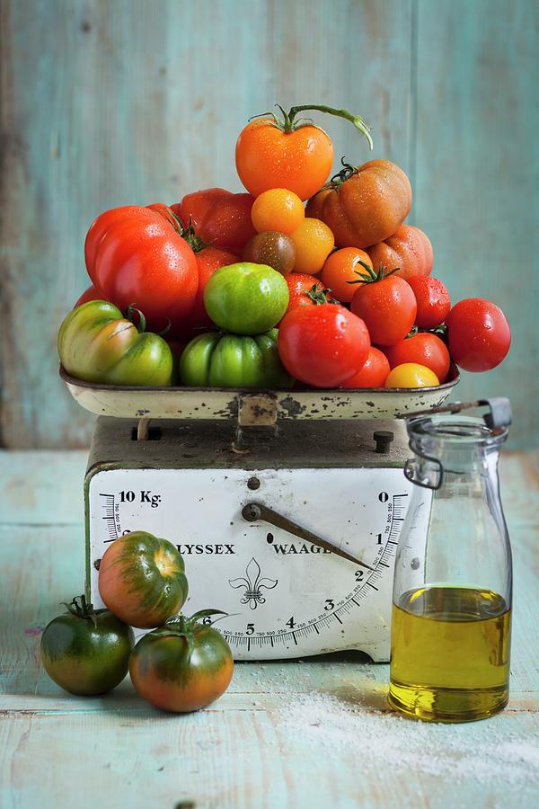 A Variety Of Tomatoes On A Kitchen Scale Photograph by Eising Studio