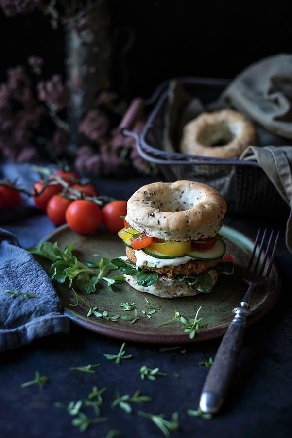 A Vegan Burger In A Linseed Bagel Photograph by Kati Neudert