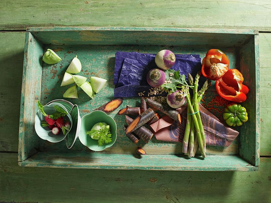 A Vegetable Crate With Asparagus, Turnips, Peppers And Tomatoes Photograph by Luzia Ellert