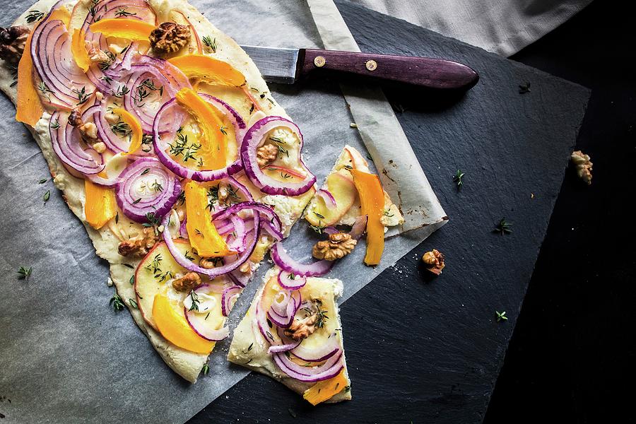 A Vegetable Pizza With Red Onions And Walnuts Photograph by Carolina Auer Photography