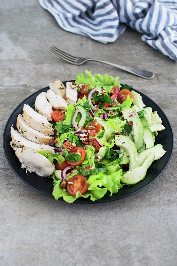 A Vegetable Salad With Sliced Chicken Breast Photograph by Justina ...