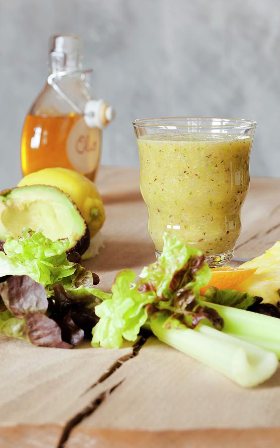 A Vegetable Smoothie Made With Lettuce, Avocado And Celery Photograph by Birgit Twellmann